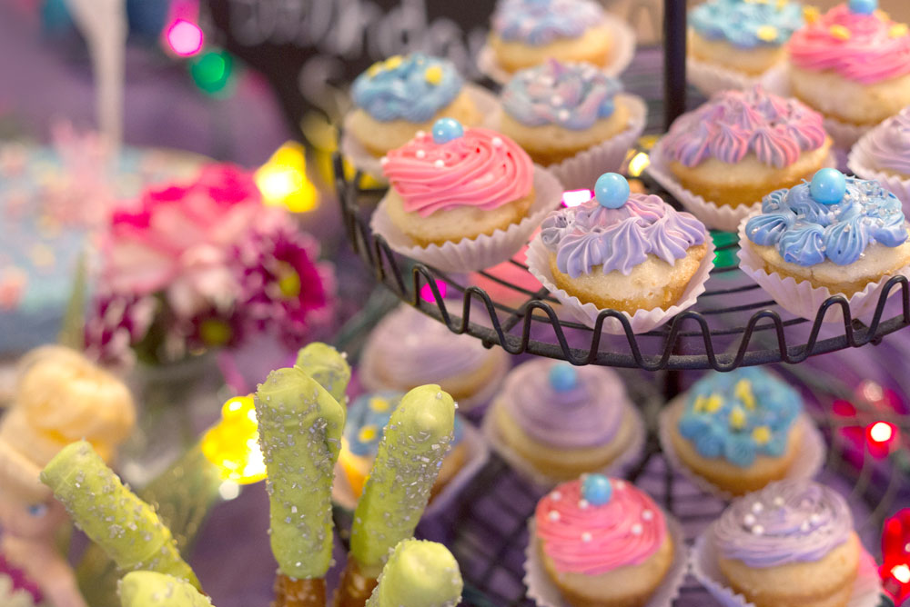 kids birthday cupcakes with pastel icing and sprinkles