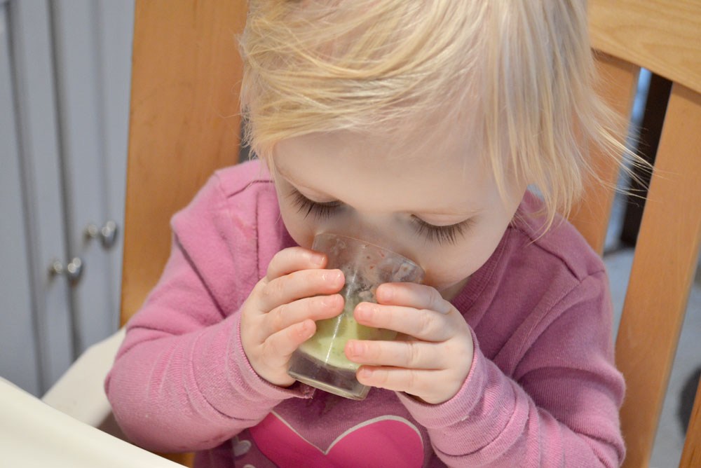 toddler drinking smoothie