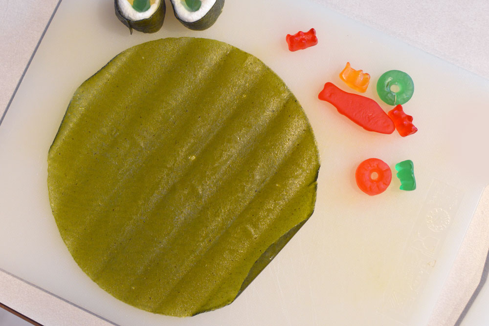 DIY Candy Sushi with fruit roll-ups, gummy candy, and marshmallows - Creative party idea