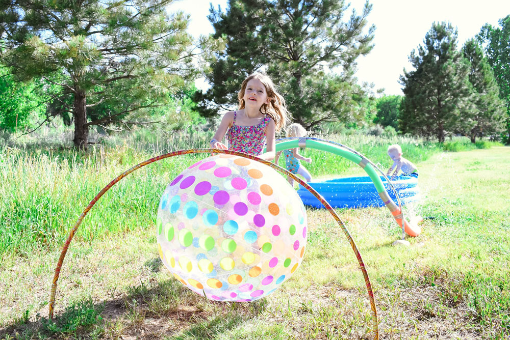My kids had fun running through our DIY pool noodle sprinkler