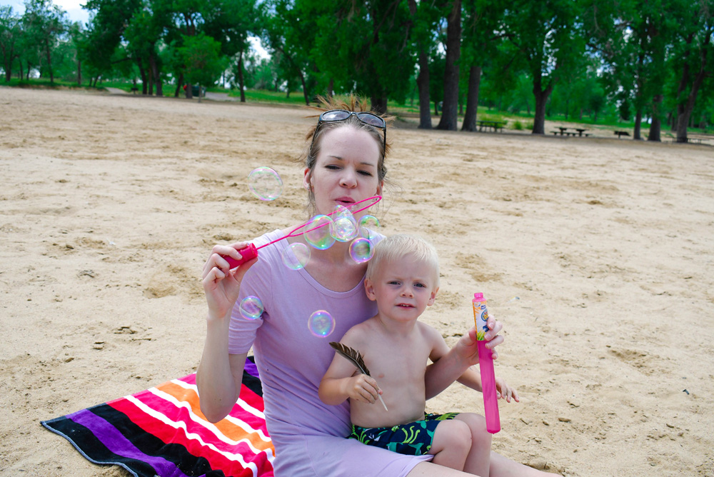 Blowing bubbles is a fun summer kids activity