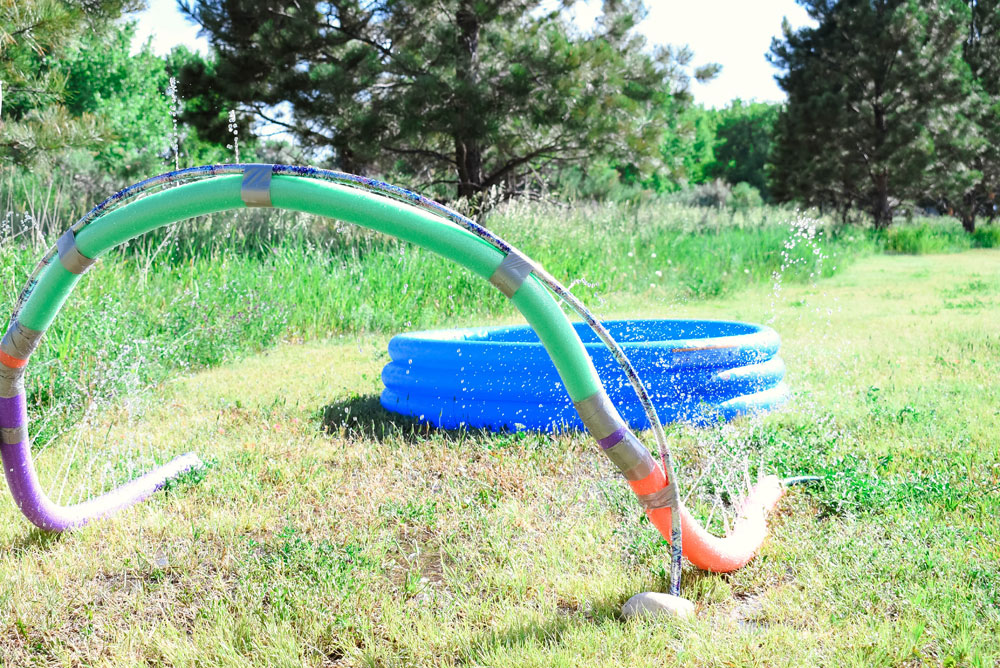 Easy DIY Pool Noodle Sprinkler for backyard summer fun
