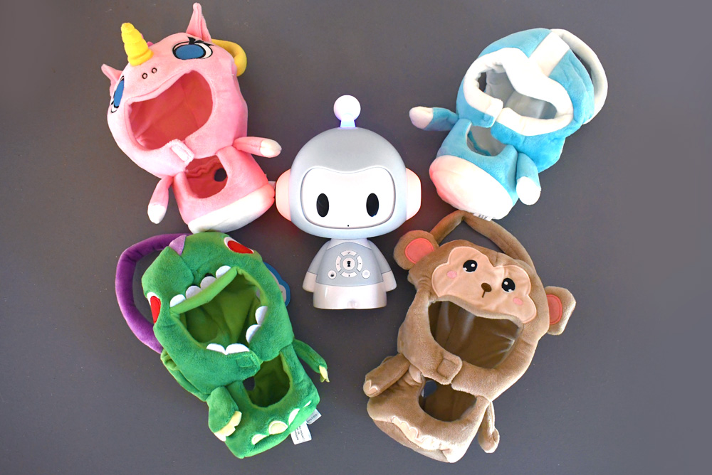 Codi storytelling robot has dinosaur, unicorn, monkey outfits