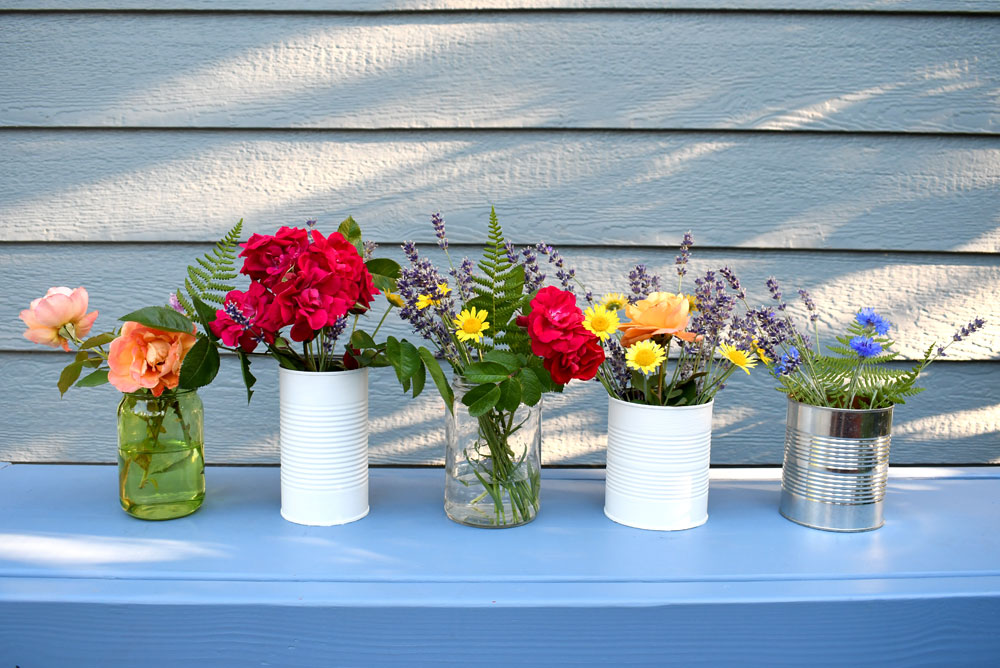 Recycled glass jars and tin cans flower vase idea