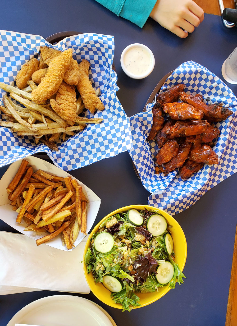 Chicken fingers, hot wings and Caesar salad at Gold Creek Lodge in Bayview, ID