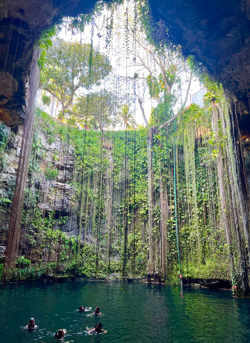 swimming in Cenote Ik Kil Yucatan