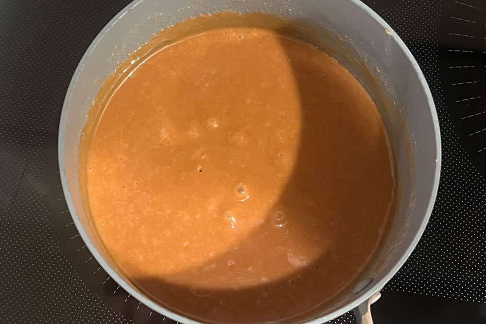 melt caramel candies to make apples