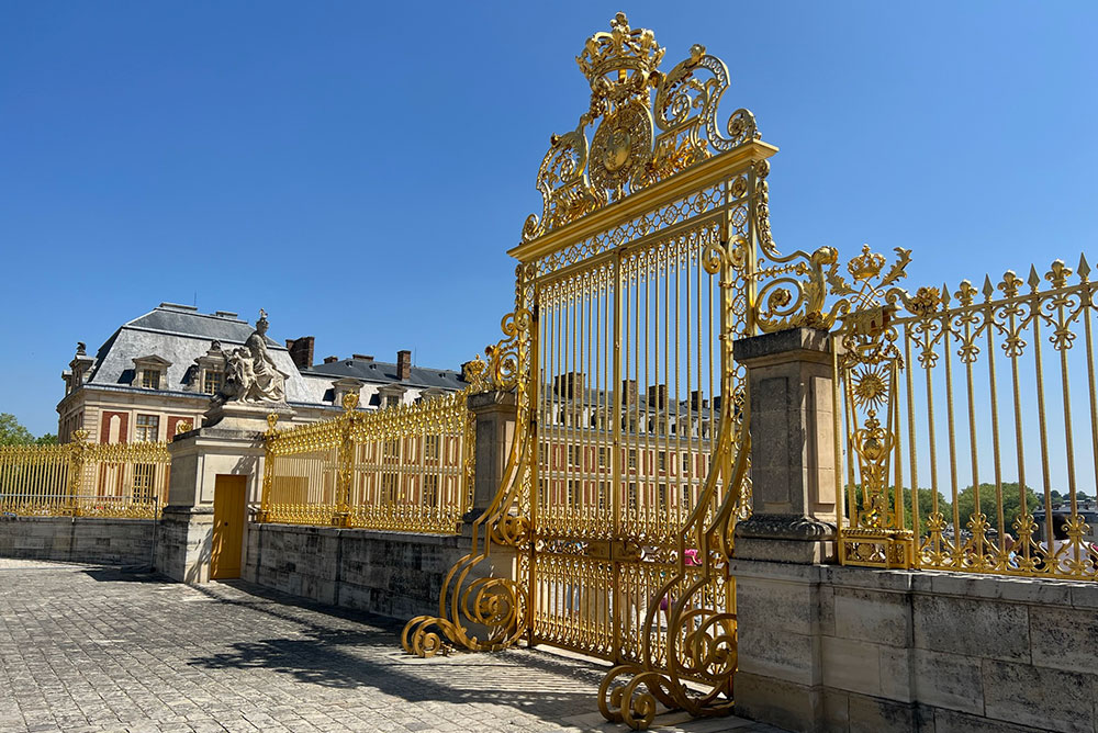 gilded gate at Palace of Versailles