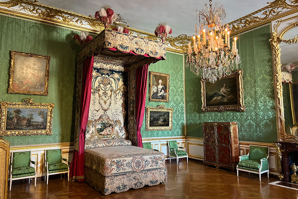 ornate green bedroom at Palace of Versailles